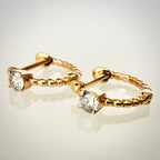 14K kultaiset luonnontimanttikorvakorut 0,22 ct vierekkäin etuviistosta