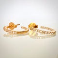 14K kultaiset timanttirengaskorvakorut 0,46 ct vierekkäin