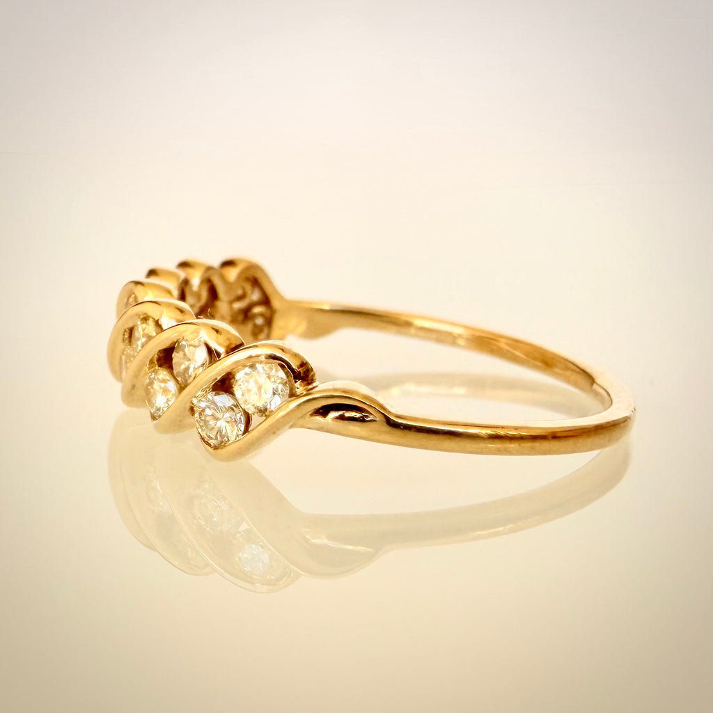 18k Vintage Timanttisormus 0,50 ct sivulta