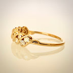 18k Vintage Timanttisormus 0,50 ct sivulta