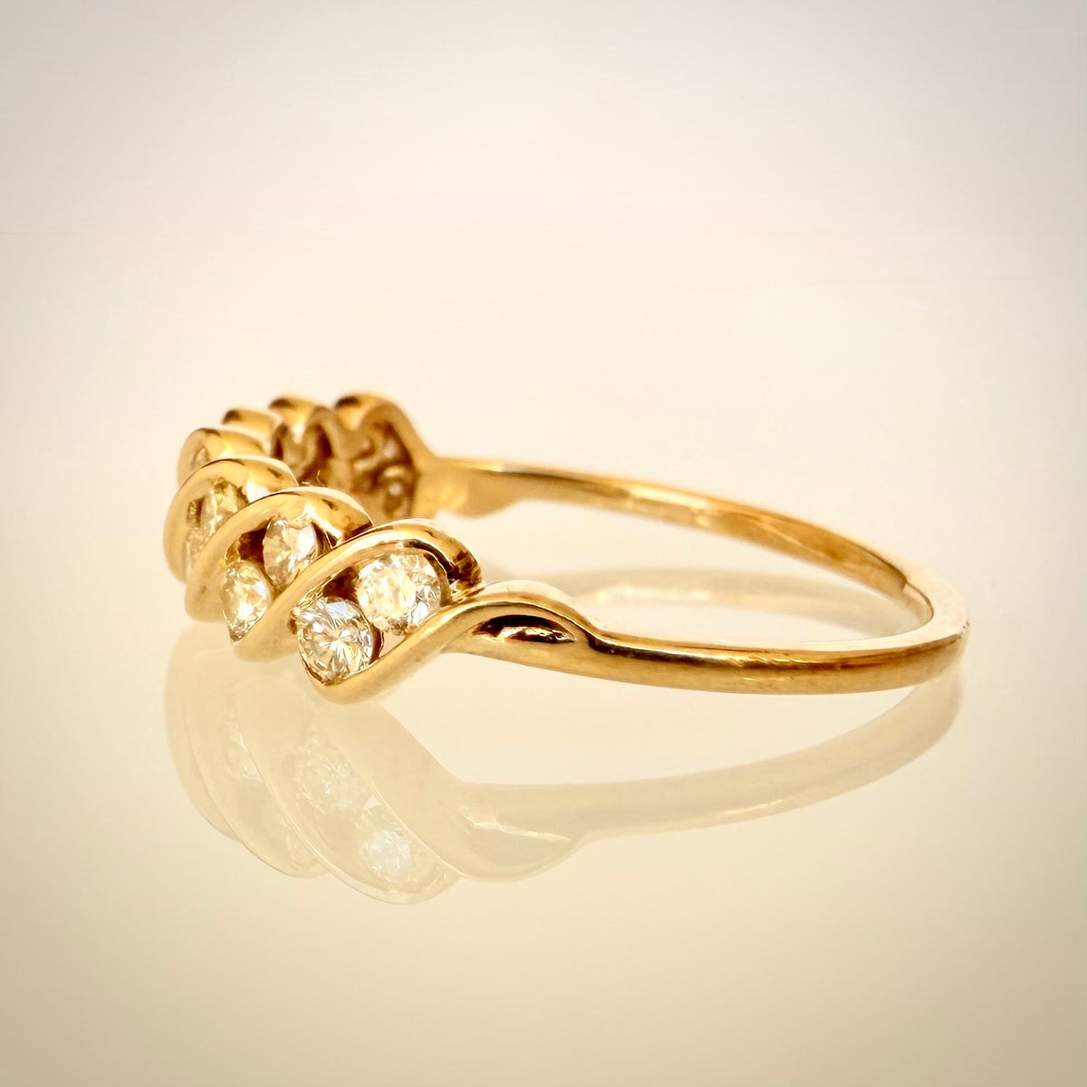 18k Vintage Timanttisormus 0,50 ct sivulta