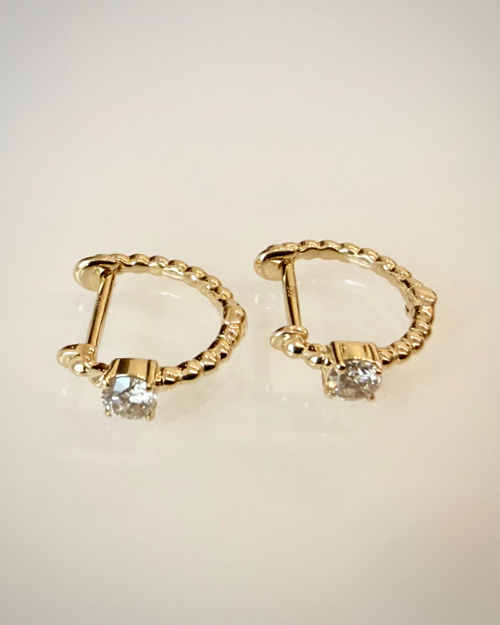 14K kultaiset luonnontimanttikorvakorut 0,22 ct