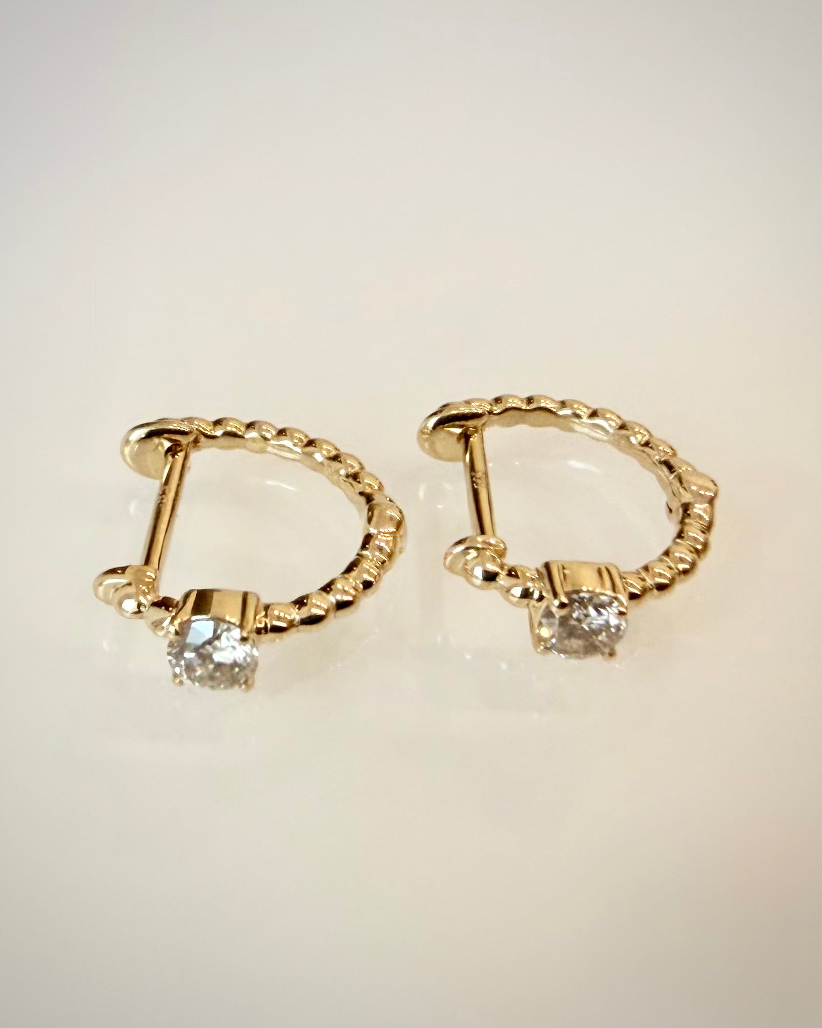 14K kultaiset luonnontimanttikorvakorut 0,22 ct