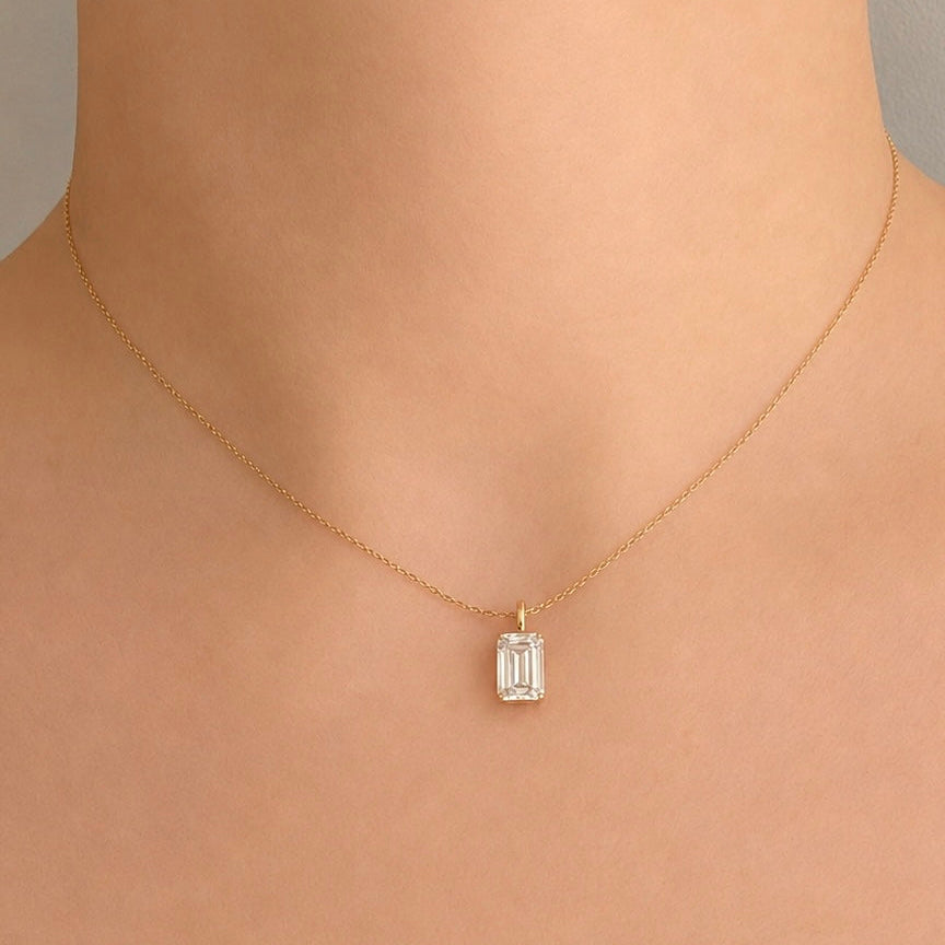 14K Timanttiriipus 2,02 ct Emerald Cut & 18K Kultaketju